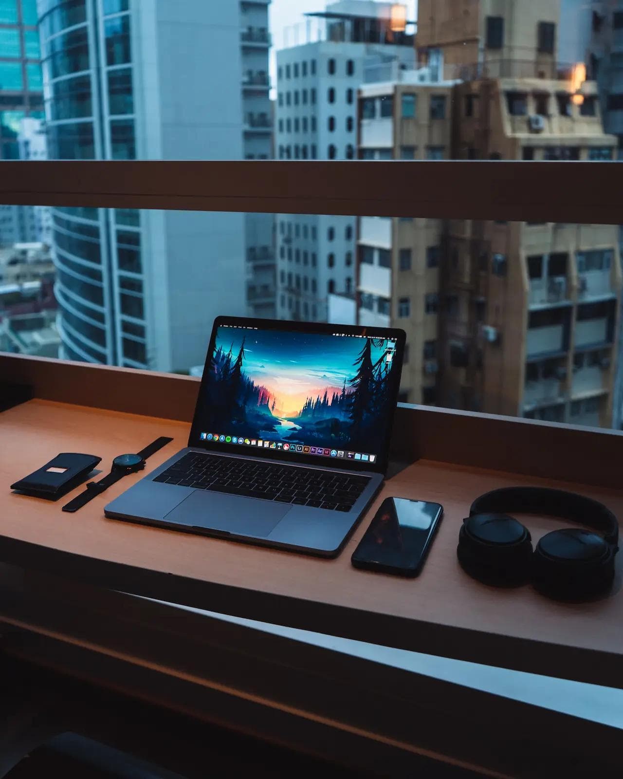 laptop computer and a city view